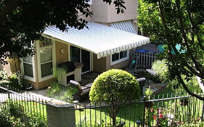 Retractable Awnings — custom fabrication and installation by AAA Awning Co., Houston Texas